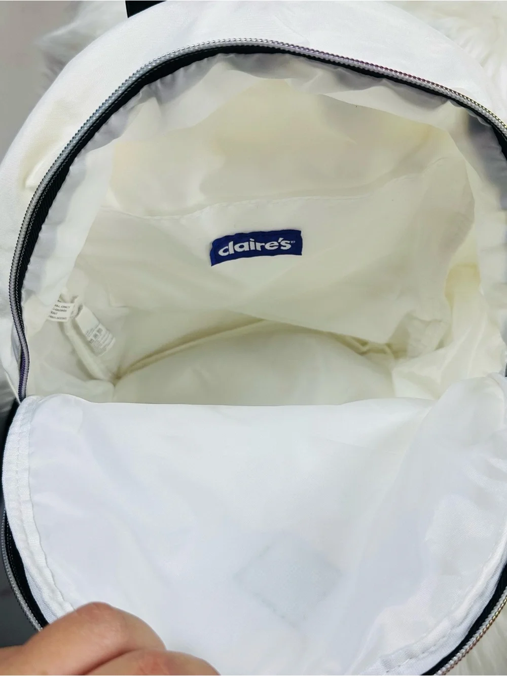 Claire's White Backpack with Black Trim and Multicolor Zipper